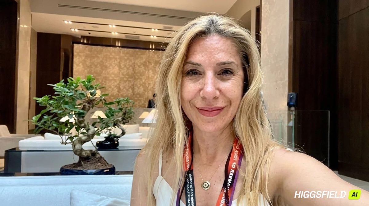 Guide Hulya Ozbek looking and smiling to the camera